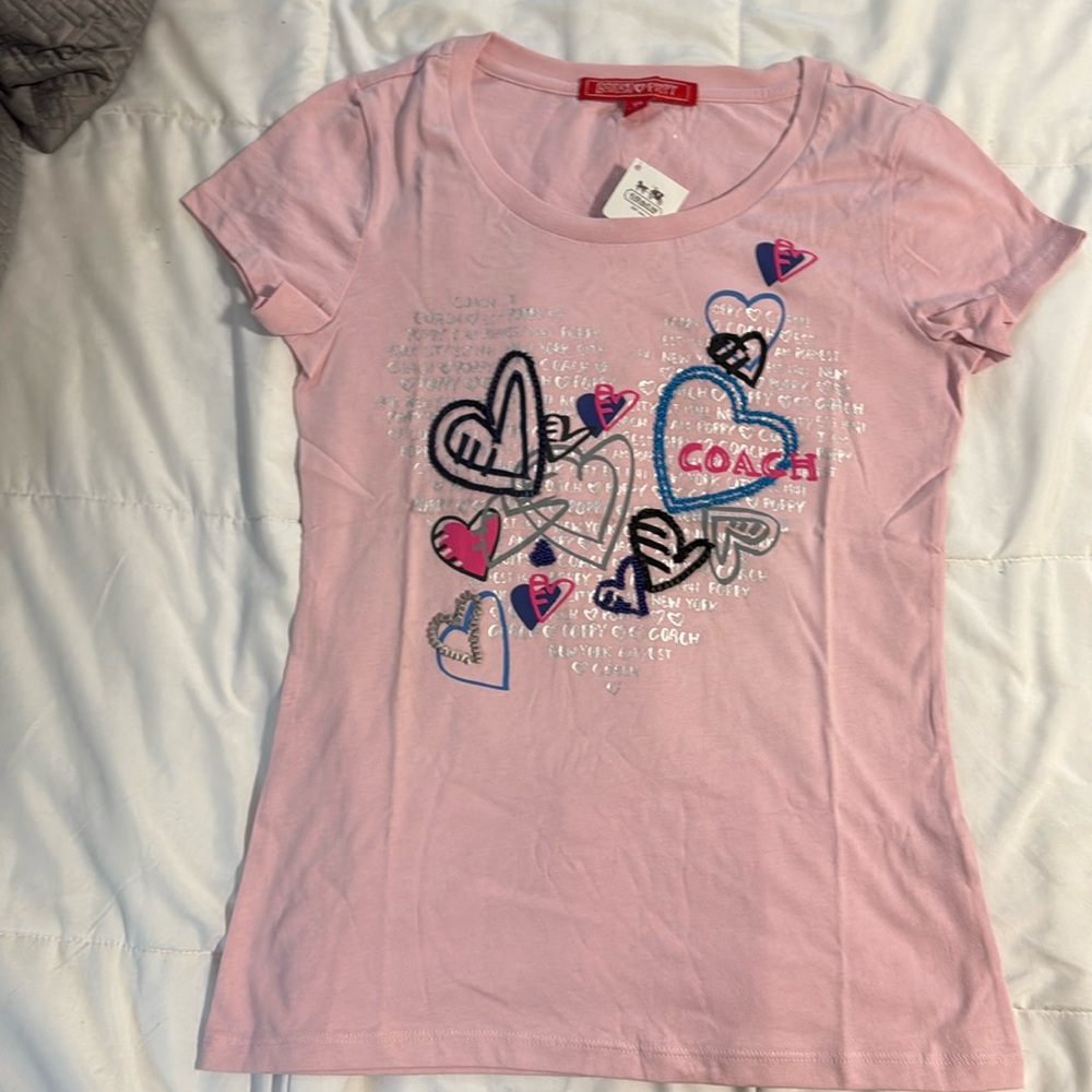 Coach Tee
Length: 24.5"
Materials
100% organic cotton